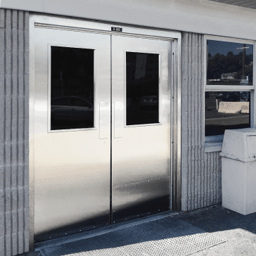 Stainless steel pedestrian doors