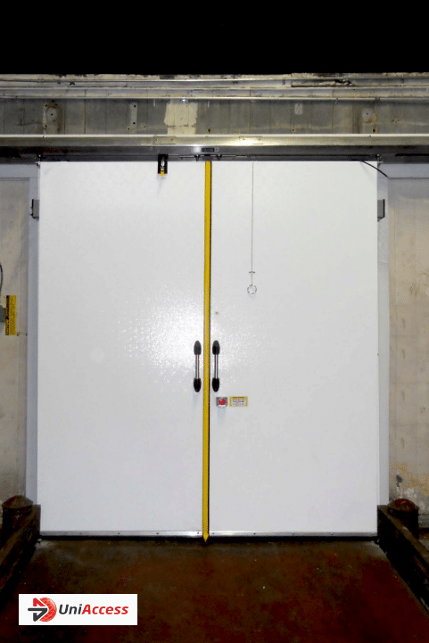 bi parting door white double door with yellow accent