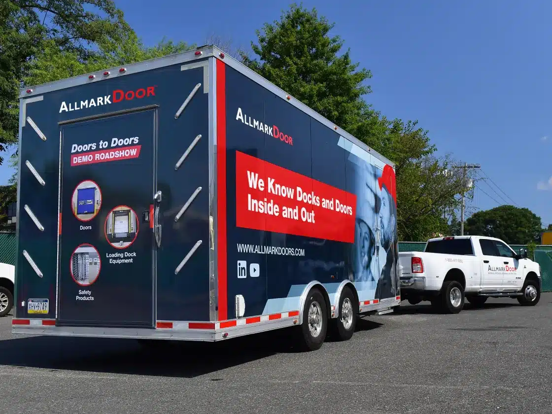 Mobile showroom and Allmark Door pickup truck.